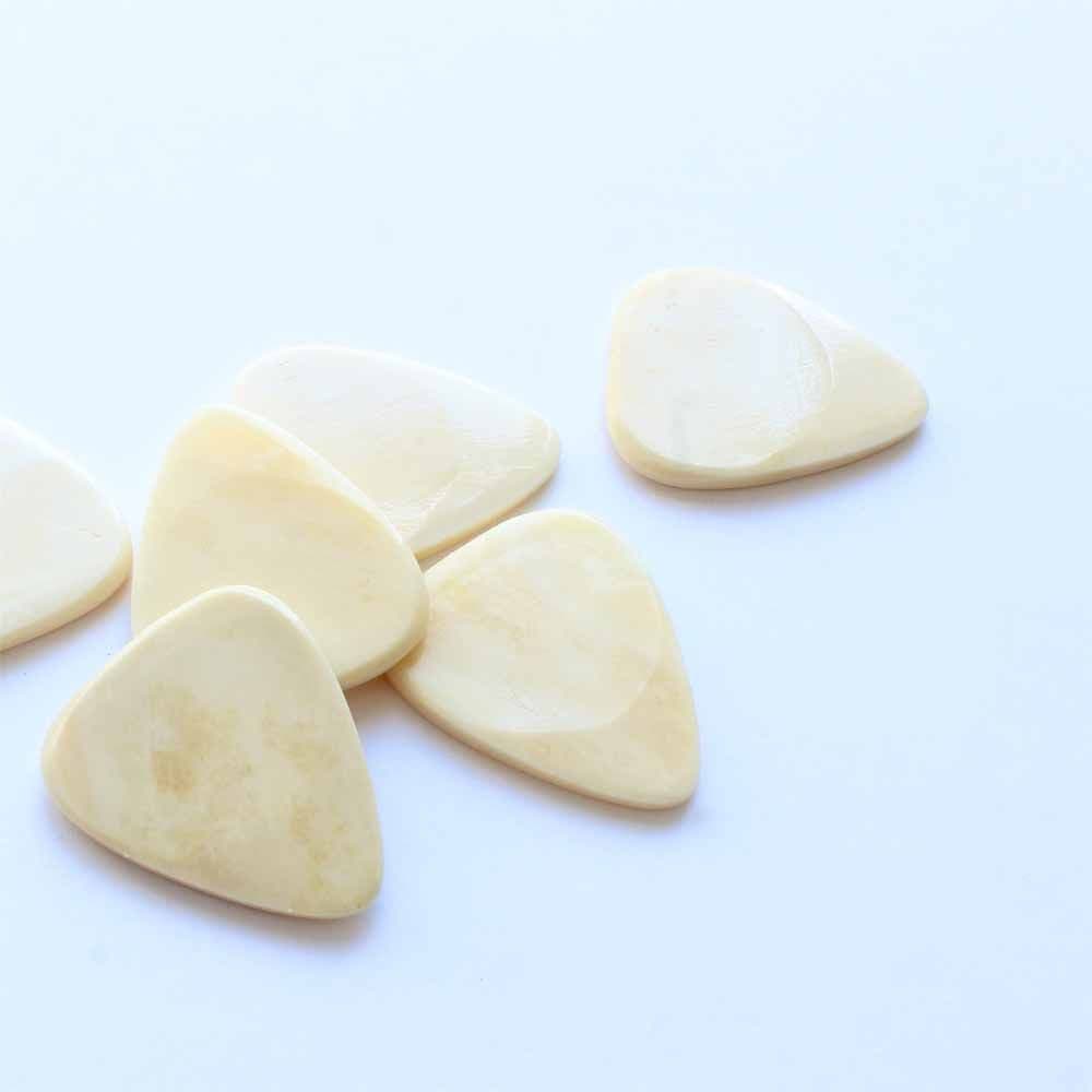 A large Selection of Bone Guitar Picks | Timber Tones - Timber Tones