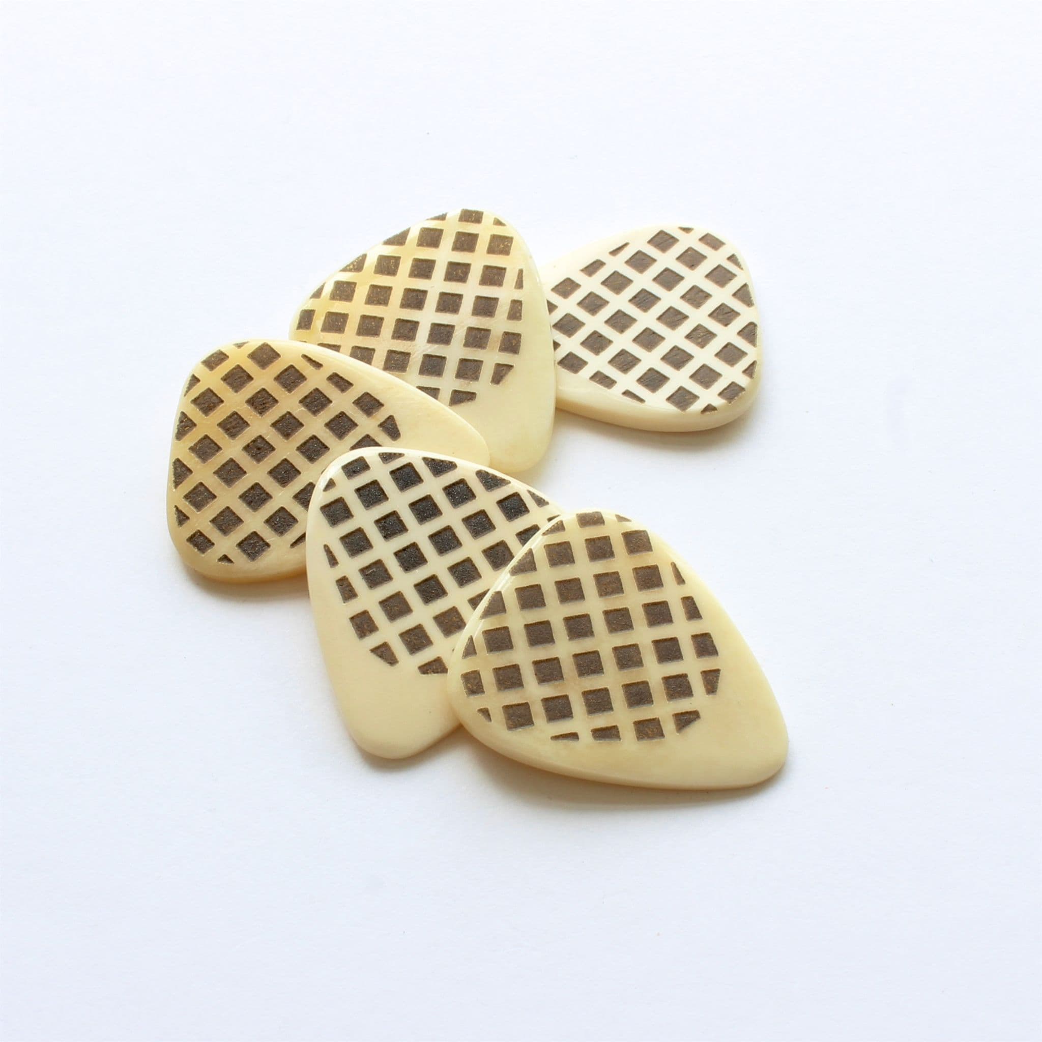 A large Selection of Bone Guitar Picks | Timber Tones - Timber Tones