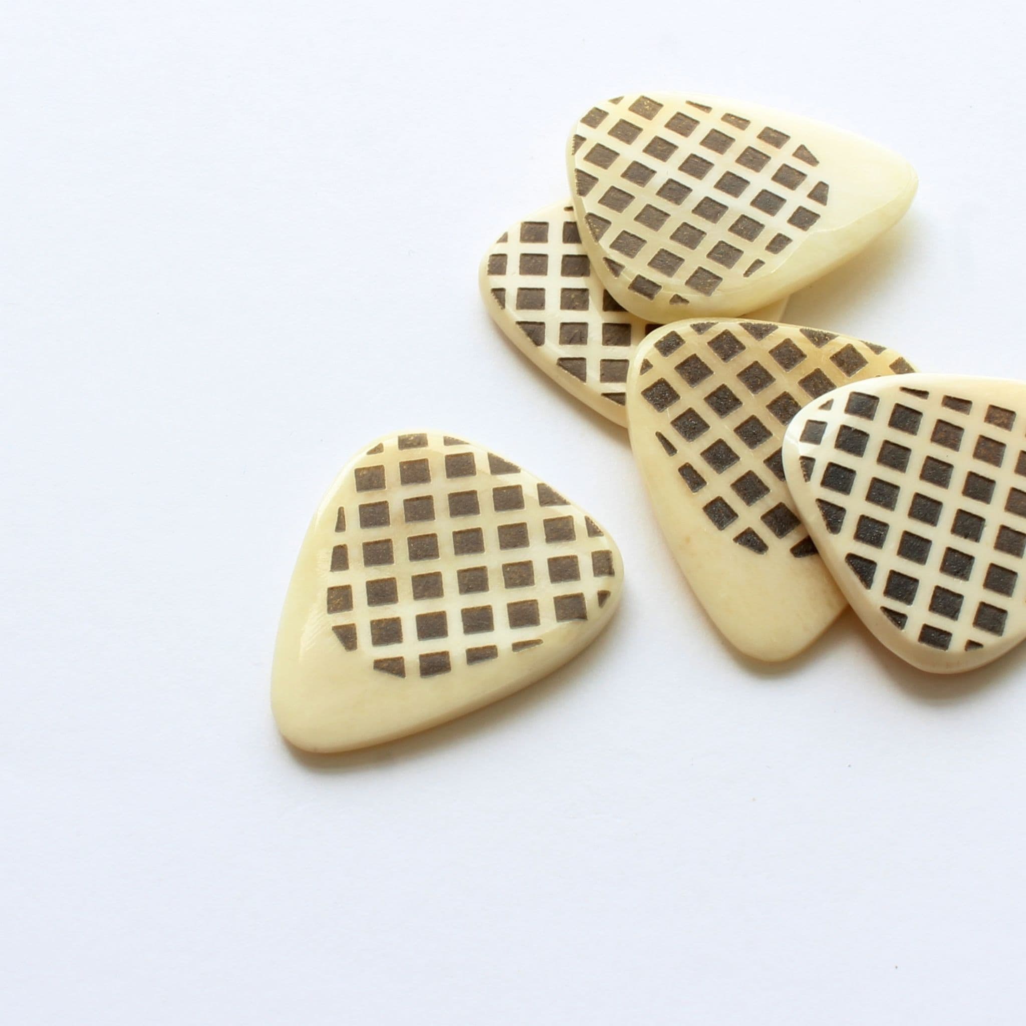 A large Selection of Bone Guitar Picks | Timber Tones - Timber Tones